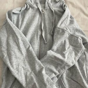 any or all of these oversized zip ups